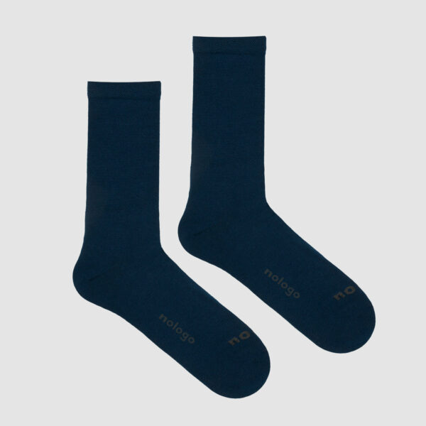 flatlay packshot of nologo merino dark blue cycling socks